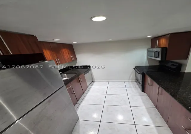 Photo 2 of Condo for sale at 1885 Ne 121st Street #8, North Miami, FL 33181 | MLS# A12087067 | Listing updated on 2026-09-11