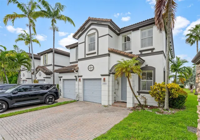 Photo 2 of Townhouse for sale at 11401 Nw 76th Terrace, Doral, FL 33178 | MLS# A12086637 | Listing updated on 2026-09-11