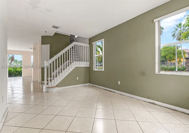 Photo 3 of Townhouse for sale at 11401 Nw 76th Terrace, Doral, FL 33178 | MLS# A12086637 | Listing updated on 2026-09-11