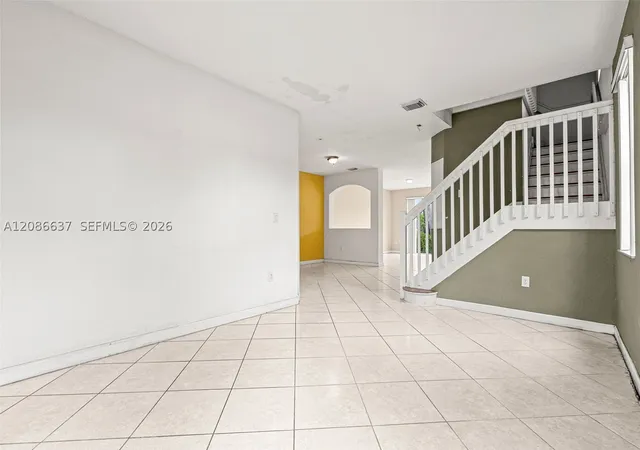 Photo 3 of Townhouse for sale at 11401 NW 76th Terrace, Doral, FL 33178 | MLS# A12086637 | Listing updated on 2026-09-11