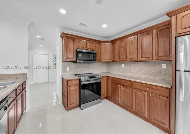 Photo 3 of Sale Pending at 10667 Nw 45th Street #10667, Coral Springs, FL 33065 | MLS# A12087016 | Listing updated on 2026-09-28