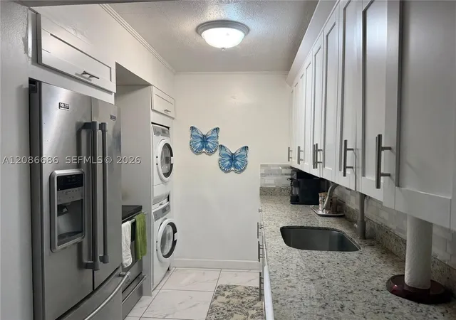Photo 3 of Condo for sale at 5033 NW 7th Street #312, Miami, FL 33126 | MLS# A12086686 | Listing updated on 2026-09-11
