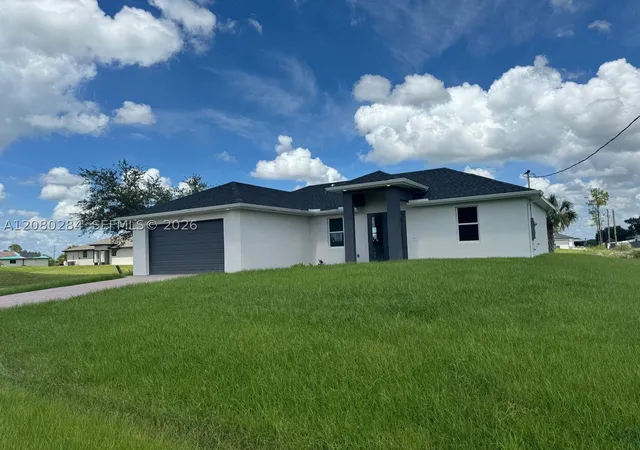 Photo 2 of Single family home for sale at 2044 Crawford Ave N, Lehigh Acres, FL 33971 | MLS# A12080284 | Listing updated on 2026-09-11