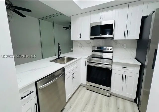 Listing Photo 4 - Condo for sale in building located at 18216 Mediterranean Blvd, Hialeah, FL 33015 - Unit #1-19