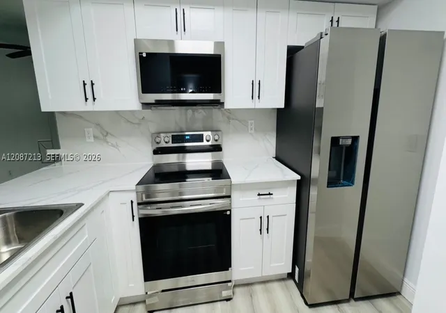 Listing Photo 5 - Condo for sale in building located at 18216 Mediterranean Blvd, Hialeah, FL 33015 - Unit #1-19
