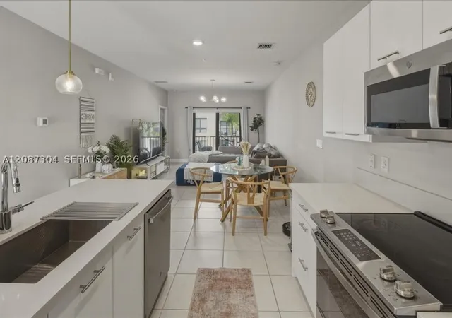 Photo 2 of Condo for sale at 8201 NW 41st Street #D-205, Doral, FL 33166 | MLS# A12087304 | Listing updated on 2026-09-11