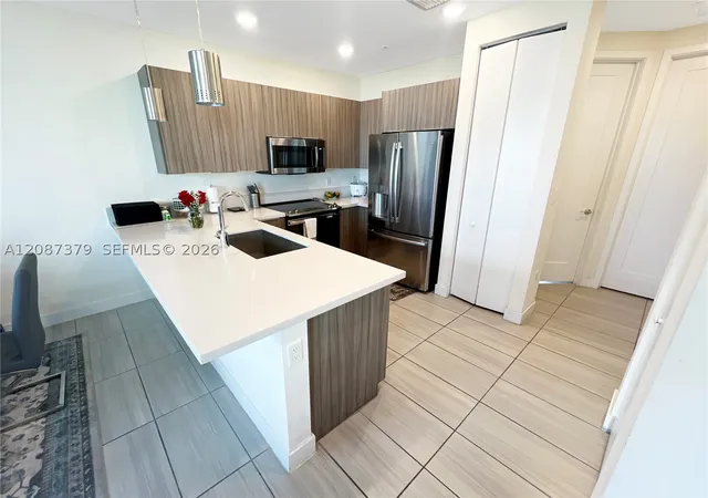 Listing Photo 5 - Condo for sale in building located at 6416 Nw 102Nd Ct, Doral, FL 33178 - Unit #304