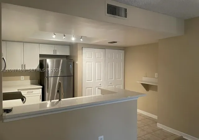 Photo 2 of Condo for sale at 4195 N Haverhill Rd #318, West Palm Beach, FL 33417 | MLS# A12087468 | Listing updated on 2026-09-11