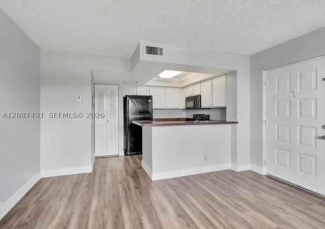 Photo 3 of Condo for sale at 714 Executive Ctr Dr #28, West Palm Beach, FL 33401 | MLS# A12087491 | Listing updated on 2026-09-12