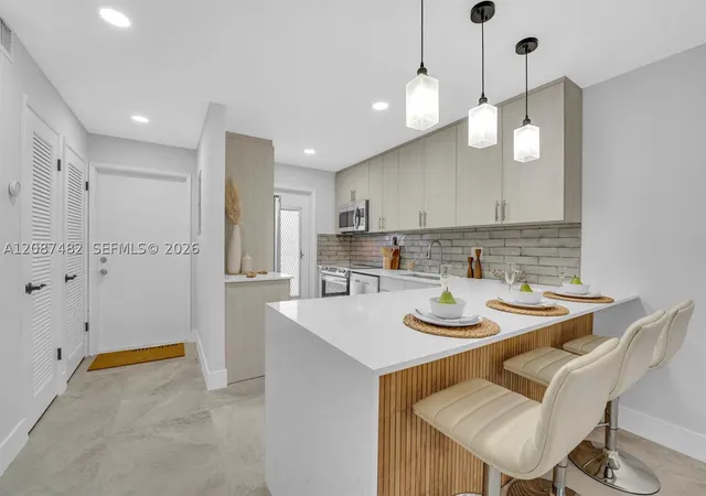 Photo 1 of Condo for sale at 400 Se 10th Street #112, Deerfield Beach, FL 33441 | MLS# A12087482 | Listing updated on 2026-09-11