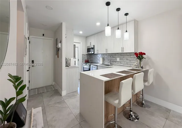 Photo 3 of Condo for sale at 400 SE 10th Street #112, Deerfield Beach, FL 33441 | MLS# A12087482 | Listing updated on 2026-09-11