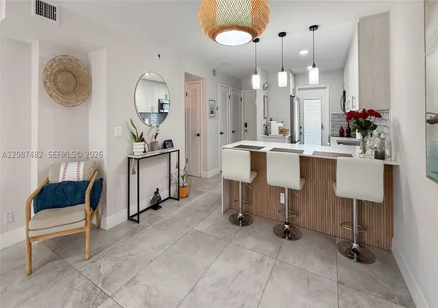 Photo 4 of Condo for sale at 400 SE 10th Street #112, Deerfield Beach, FL 33441 | MLS# A12087482 | Listing updated on 2026-09-11