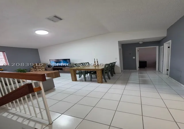 Listing Photo 4 - Condo for sale in building located at 10101 W Okeechobee Rd, Miami, FL 33016 - Unit #10-202