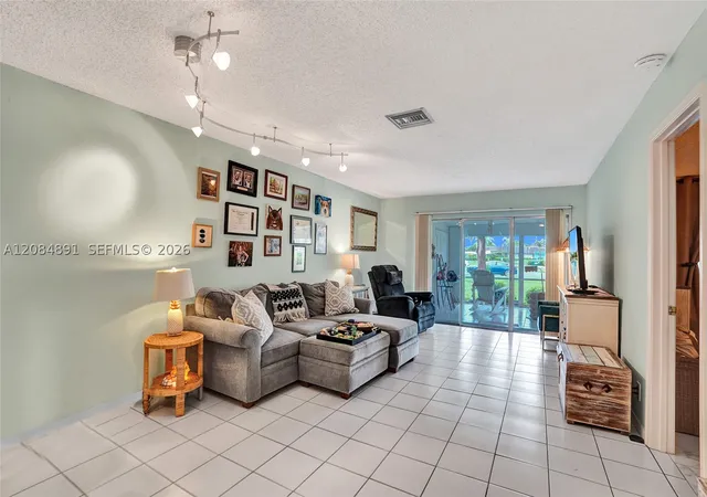 Photo 3 of Condo for sale at 1580 NW 18th Avenue #98-B, Delray Beach, FL 33445 | MLS# A12084891 | Listing updated on 2026-09-12