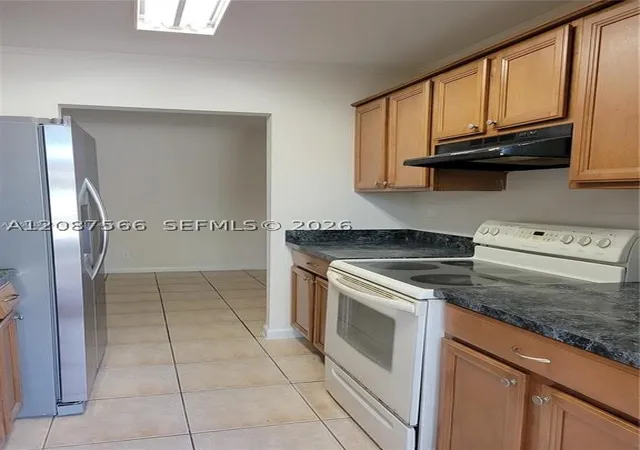 Photo 3 of Condo for sale at 8704 Nw 35th Street #105, Coral Springs, FL 33065 | MLS# A12087566 | Listing updated on 2026-10-06