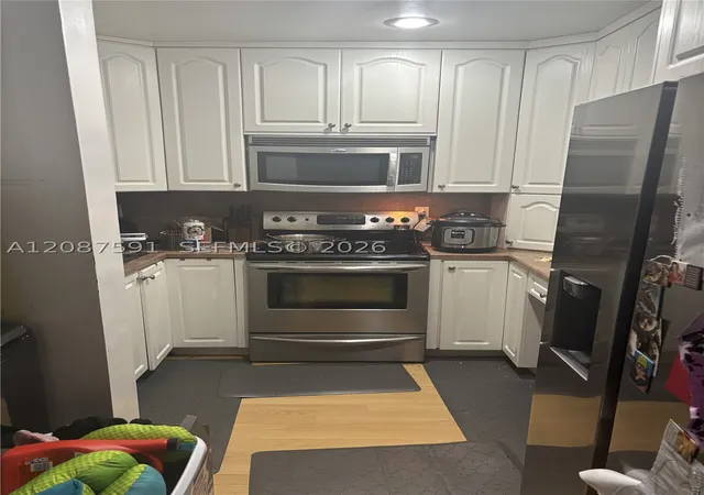 Listing Photo 4 - Condo for sale in building located at 11128 Royal Palm Blvd, Coral Springs, FL 33065 - Unit #8-10