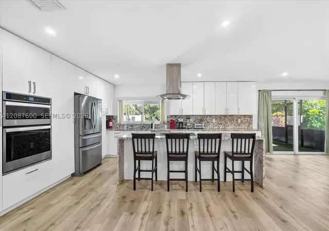 Photo 3 of Single family home for sale at 3211 Calle Largo Dr, Hollywood, FL 33021 | MLS# A12087600 | Listing updated on 2026-09-11