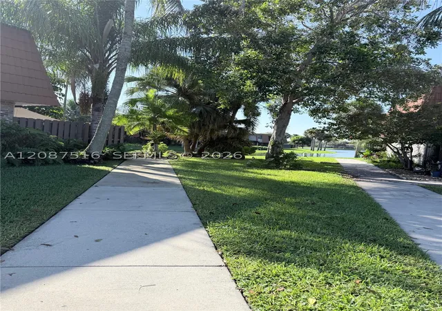Photo 3 of Townhouse for sale at 11006 N Harmony Lake Cir, Davie, FL 33324 | MLS# A12087516 | Listing updated on 2026-09-14