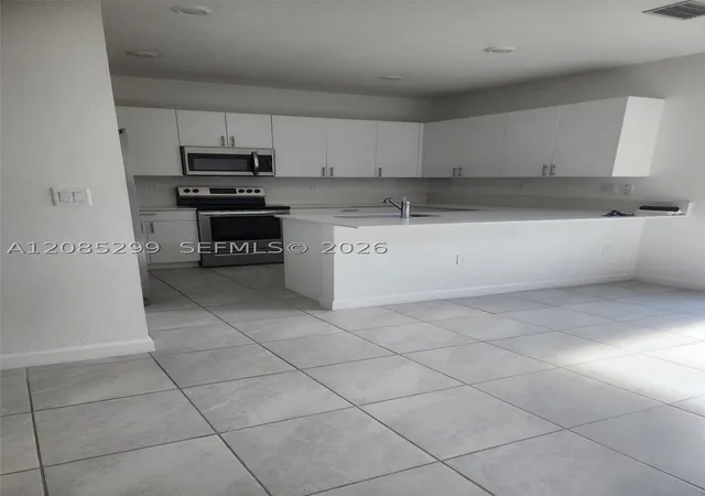 Photo 3 of Townhouse for sale at 12946 SW 232nd Terrace #12946, Homestead, FL 33032 | MLS# A12085299 | Listing updated on 2026-09-12
