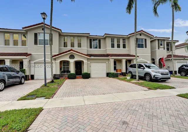 Photo 2 of Townhouse for sale at 220 Riverwalk Cir, Sunrise, FL 33326 | MLS# A12082751 | Listing updated on 2026-09-13
