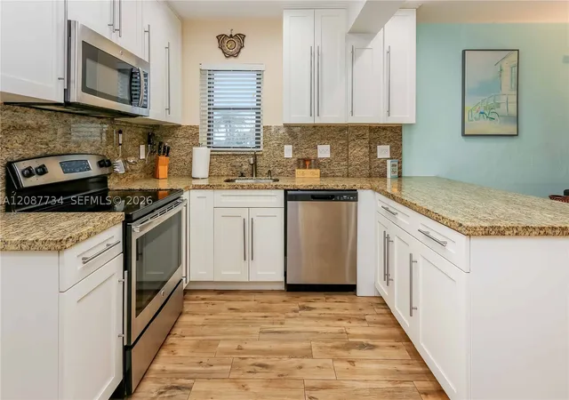 Photo 3 of Condo for sale at 3300 N Surf Rd #1A, Hollywood, FL 33019 | MLS# A12087734 | Listing updated on 2026-09-12