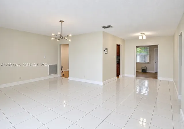 Photo 4 of Single family home for sale at 7303 NW 59th Street, Tamarac, FL 33321 | MLS# A12087705 | Listing updated on 2026-09-12