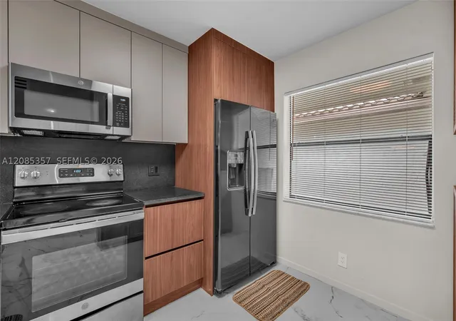 Photo 3 of Condo for sale at 11158 W Sample Rd #11158, Coral Springs, FL 33065 | MLS# A12085357 | Listing updated on 2026-09-16