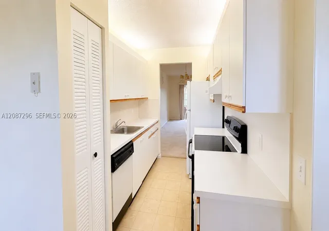 Photo 2 of Condo for sale at 12900 Sw 13th Street #413E, Pembroke Pines, FL 33027 | MLS# A12087296 | Listing updated on 2026-09-12