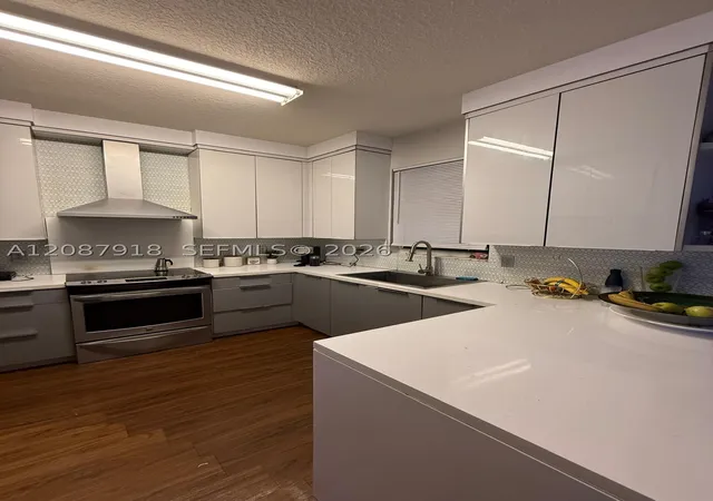 Photo 3 of Townhouse for sale at 13226 SW 128th Passage, Miami, FL 33186 | MLS# A12087918 | Listing updated on 2026-09-14