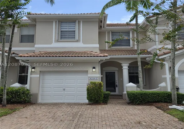 Photo 1 of Townhouse for sale at 12317 Sw 124th Court, Miami, FL 33186 | MLS# A12087930 | Listing updated on 2026-09-22