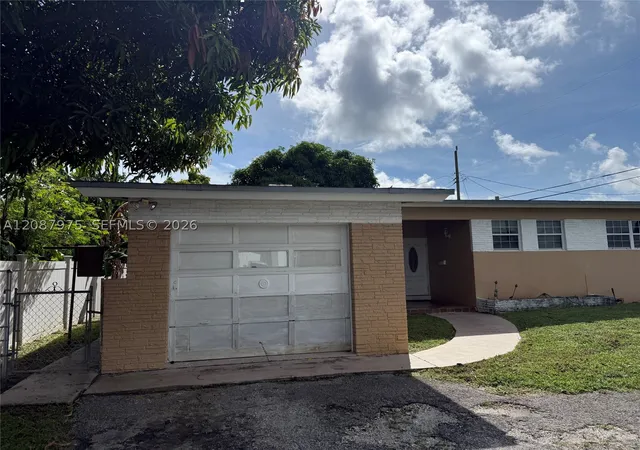 Photo 2 of Single family home for sale at 1409 S 24th Terrace, Hollywood, FL 33020 | MLS# A12087975 | Listing updated on 2026-09-12