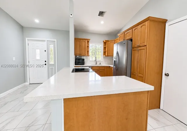 Photo 4 of Single family home for sale at 8331 NW 44th Court, Lauderhill, FL 33351 | MLS# A12088024 | Listing updated on 2026-09-14