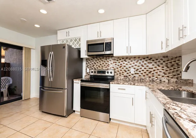 Photo 3 of Townhouse for sale at 4755 NW 30th Street, Coconut Creek, FL 33063 | MLS# A12088035 | Listing updated on 2026-09-12