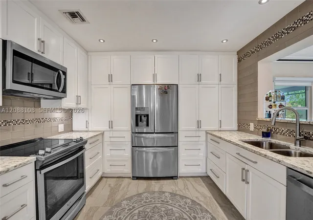 Photo 2 of Single family home for sale at 418 Nw 20th Street, Wilton Manors, FL 33311 | MLS# A12088108 | Listing updated on 2026-09-13