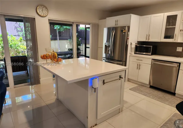 Photo 4 of Single family home for sale at 1085 NE 203rd Lane, Miami, FL 33179 | MLS# A12088086 | Listing updated on 2026-09-13