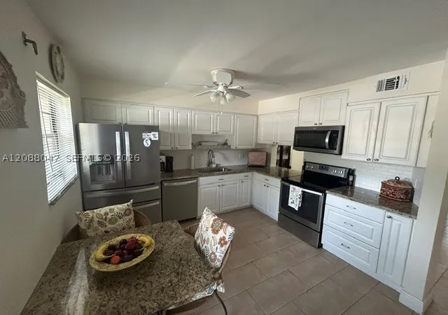 Photo 1 of Condo for sale at 2 Briarwood Cir #112, Hollywood, FL 33024 | MLS# A12088047 | Listing updated on 2026-09-13