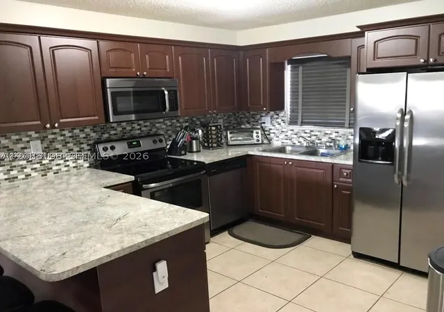 Photo 3 of Single family home for sale at 15302 Sw 180th Terrace, Miami, FL 33187 | MLS# A12088198 | Listing updated on 2026-09-13