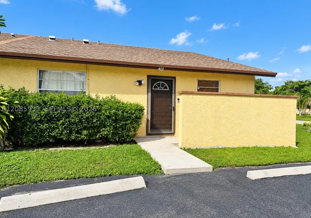 Photo 1 of Townhouse for sale at 401 Nw 43rd Street, Deerfield Beach, FL 33064 | MLS# A12085933 | Listing updated on 2026-09-14