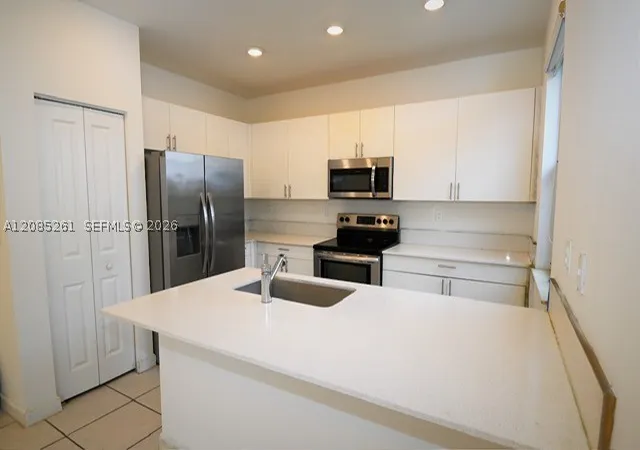 Photo 3 of Townhouse for sale at 23440 SW 129th Avenue, Homestead, FL 33032 | MLS# A12085261 | Listing updated on 2026-09-14