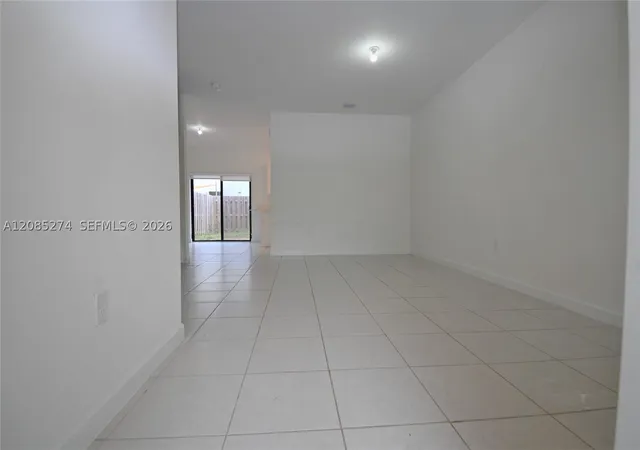 Photo 3 of Townhouse for sale at 23444 SW 129th Avenue, Homestead, FL 33032 | MLS# A12085274 | Listing updated on 2026-09-14