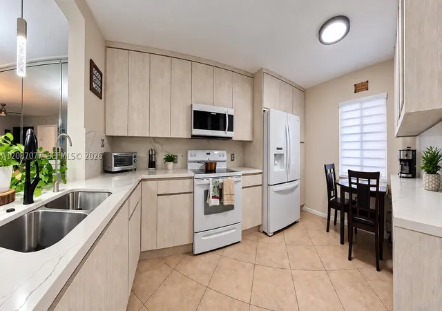 Photo 4 of Condo for sale at 1400 SW 137th Avenue #305F, Pembroke Pines, FL 33027 | MLS# A12087077 | Listing updated on 2026-09-15
