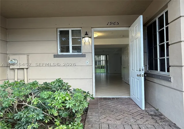 Photo 1 of Condo for sale at 1965 Freeport Ln #1965, Riviera Beach, FL 33404 | MLS# A12085457 | Listing updated on 2026-09-14