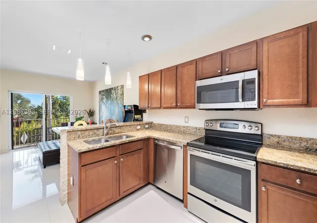 Photo 4 of Condo for sale at 8800 NW 97th Avenue #204, Doral, FL 33178 | MLS# A12087398 | Listing updated on 2026-09-14