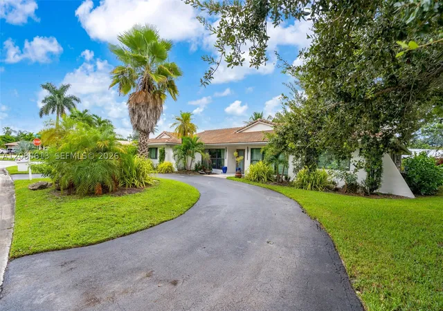 Photo 2 of Single family home for sale at 9900 Nw 14th Court, Coral Springs, FL 33071 | MLS# A12088613 | Listing updated on 2026-09-17
