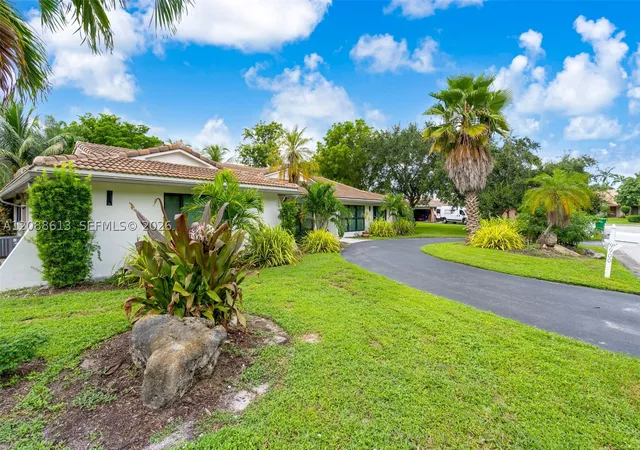 Photo 3 of Single family home for sale at 9900 Nw 14th Court, Coral Springs, FL 33071 | MLS# A12088613 | Listing updated on 2026-09-17