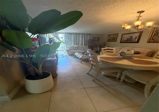 Photo 2 of Condo for sale at 10090 Northwest 80 Ct #1327, Hialeah Gardens, FL 33016 | MLS# A12086196 | Listing updated on 2026-09-14