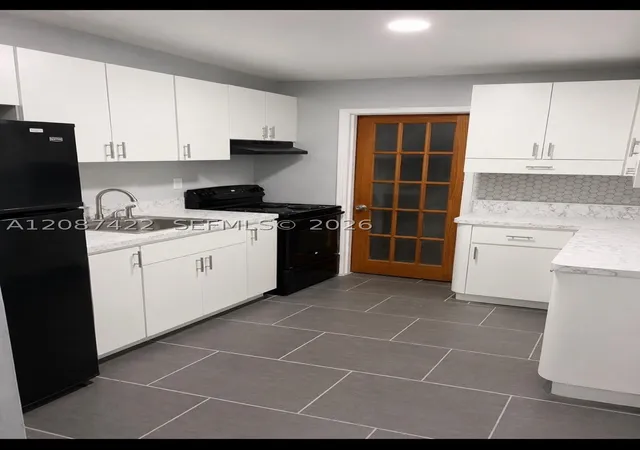 Photo 2 of Single family home for sale at 1810 Rutland St, Opa Locka, FL 33054 | MLS# A12087422 | Listing updated on 2026-09-25