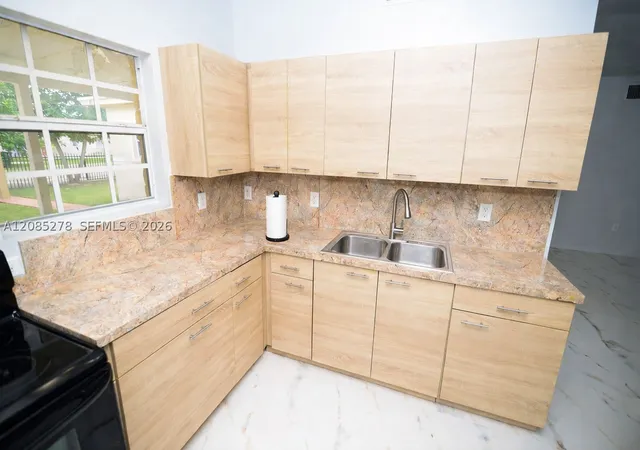 Photo 2 of Single family home for sale at 298 Nw 104th Street, Miami, FL 33150 | MLS# A12085278 | Listing updated on 2026-09-14