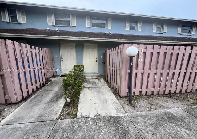 Photo 1 of Townhouse for sale at 910 E Cypress Way, Palm Springs, FL 33406 | MLS# A12088961 | Listing updated on 2026-09-15