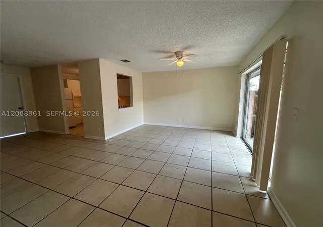 Photo 4 of Townhouse for sale at 910 E Cypress Way, Palm Springs, FL 33406 | MLS# A12088961 | Listing updated on 2026-09-15